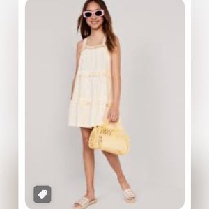 SOLD.       
NWT Cream Tiered Eyelet Ruffled Mini Dress,  Size L- 10-12 Girls